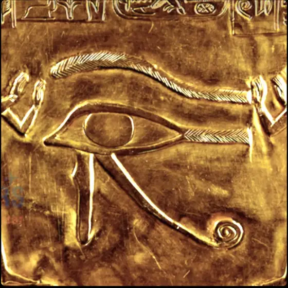 The Eye of Horus carved into a gold panel.